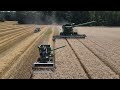 John Deere 40 and S680 Combines Harvesting Wheat