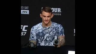 Conor McGregor appreciating Dustin Porrier and his hot sauce at face off before ufc 257