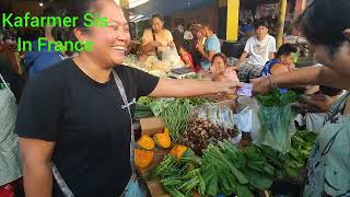 Francky Really enjoying the Market…laughing with Vendors….