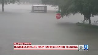 Rescuers pluck hundreds from floodwaters in Houston