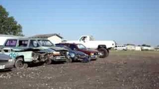 4x4 monster truck crushes cars