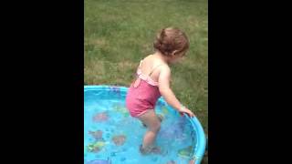 Lyla playing in the pool at her new house