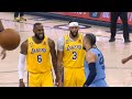 Anthony Davis and LeBron James taunt Dillon Brooks after AD blocks his shot into the crowd