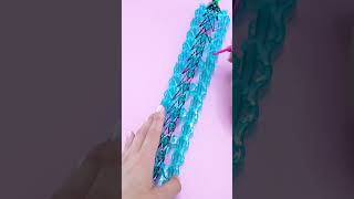 ASMR of removing the Snake Charm bracelet from two Rainbow Looms! Full tutorial on our channel🐍🌈