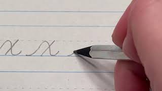 Lowercase "x" in cursive