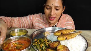 EATING FISH CURRY, FRIED FISH, BENGAN FRY, ONION LEAVES AND ALOO FRY, DAL WITH RICE