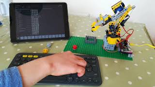 Lego Technic robot arm, controlled by Raspberry Pi, picking up bricks