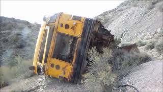 Susan Powell outside the  mines behind Topaz mountain around the mines are closed with school bus