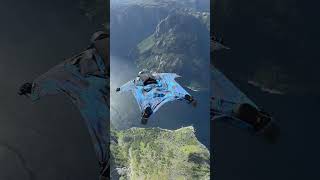 Wingsuit base jump off norway cliff