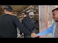 mahmoud buys food supplies for nomads