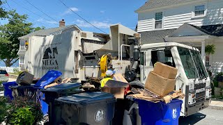 Mega’s Bridgeport Garbage Truck Packing A Rear Load Route