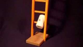 Japanese Folk Toy Tumbling Daruma on Ladder