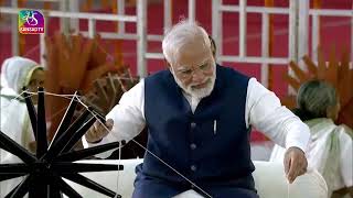 PM Modi spins charkha at Khadi Utsav in Ahmedabad