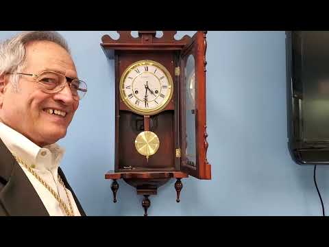 How do you wind a pendulum clock?