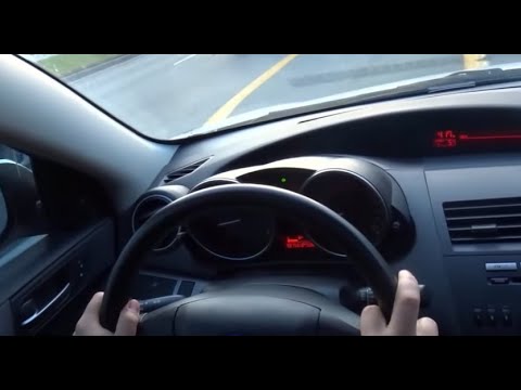 What causes a loud humming noise while driving?