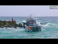 million dollar boat crashes into rocks at boca inlet haulover inlet boats wavy boats