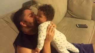 Daddy's beard tickles