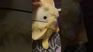 Unboxing squishmallow Nomi the banana bigfoot from toy drops on the tic Tok shop