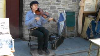 Jacques Dupuis Performing Two Traditional Quebec Songs \