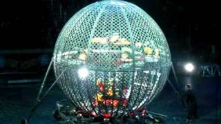 Globe of death - seven motorcycles in a sphere at the circus.