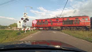 รถไฟ รถไฟไทย ทางข้ามทางรถไฟบ้าน บ้านมะหลัดใหญ่ อำเภออุทุมพรพิสัย จังหวัดศรีสะเกษ