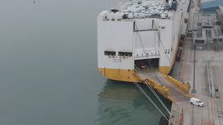 Aerial View of 2000 cars and vans being transported by ship to Southampton Port.