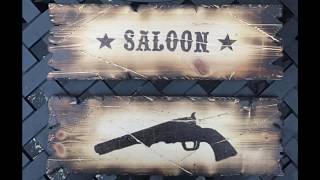 Finishing touches to the Western style saloon sign, handmade pyrography decor for the mancave!