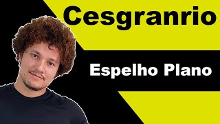 CESGRANRIO - Espelho plano - Sentado na cadeira da Barberaria, um rapaz olha no espelho a imagem...