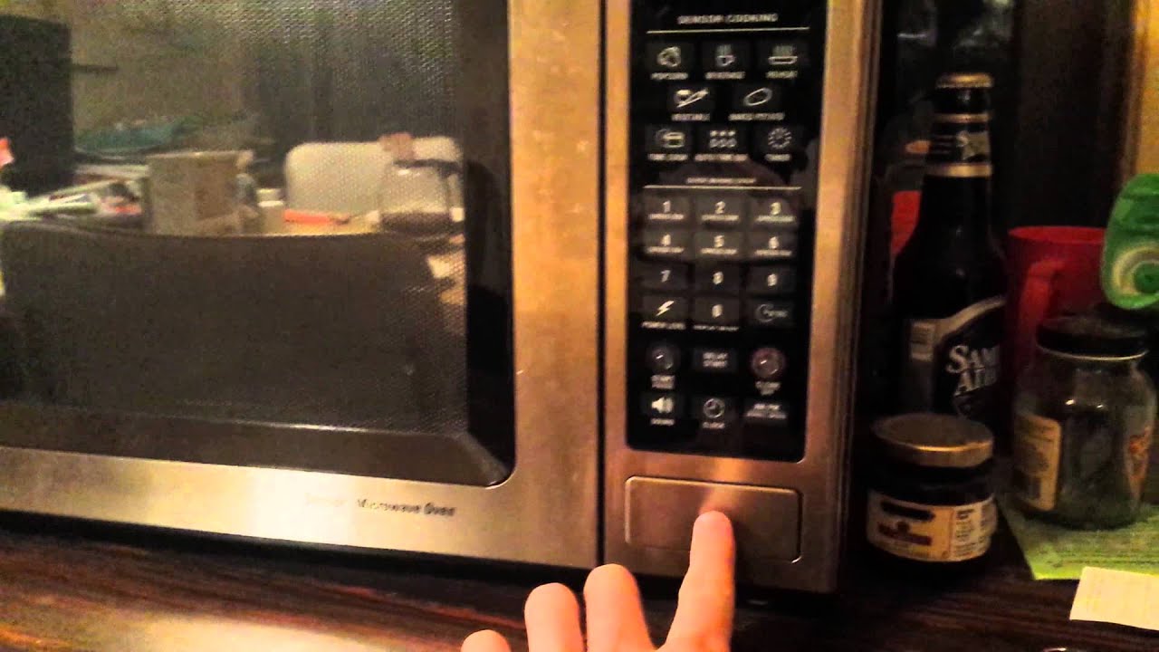 GE Microwave Turns On By Itself - YouTube