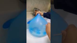 popping a glove with water filled #satisfying