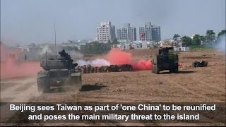 Taiwan simulates China attacks as tension rises