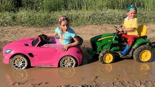 Sofia Ride On Car Toy and stuck in the mud! Max helps on the Tractor