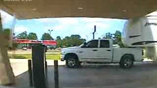 Truck knocks down bank drive through roof