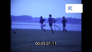 1970s Men Playing Rugby by the Sea, UK Home Movies