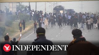 Police tear gas protesters in Pakistan after Imran Khan shooting