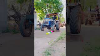 Tractor Popping Water Balloon #shorts #viral #trending