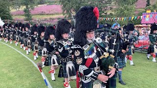 Afternoon parade with the Lonach Highlanders during the 2022 Lonach Gathering and Games in Scotland