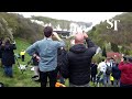 Spectators gather to watch controlled demolition of German bridge