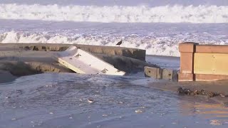 High surf floods Mission Beach boardwalk