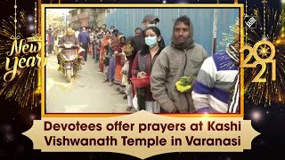 Devotees offer prayers at Kashi Vishwanath Temple in Varanasi