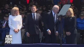 Awkward moment Jill Biden appears to tell Joe not to sit at D-Day ceremony, but