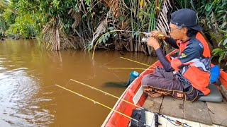 This angler jumps up and down in the boat while fishing for giant prawns