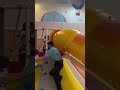 KIDS HAVE FUN PLAYING COLORFUL SLIDES AT THE INDOOR PLAYGROUND PLAYTOPIA | VISITS PLAYGROUND #shorts