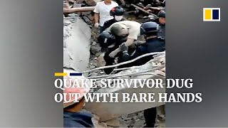 Policemen dig out man with bare hands as hunt for survivors of China’s deadly earthquake continues