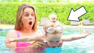 Teaching our 2 YR OLD BABY to SWIM! | Family Fizz