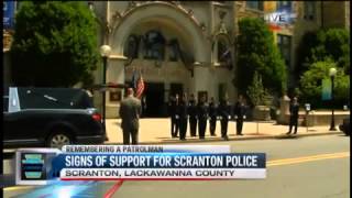 Body of Officer Wilding Arrives at College for Viewing