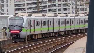 1129次基隆發車經由西部幹線開往北湖的銀綠色微笑號EMU900型十輛一編組EMU940區間車