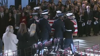 Former President Carter lies in repose at the Carter Presidential Center in Atlanta until Tuesday