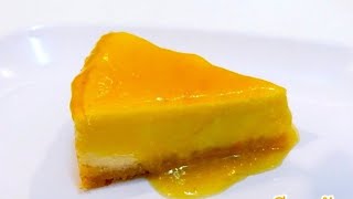 ชีสเค้กมะม่วง นิวยอร์กชีสเค้กราดด้วยซอสมะม่วงหอมหวาน  Cheesecake topped with sweet mango sauce