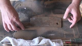 restoring an old broken antique rusty meat cleaver